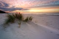 Beautiful sunset on the Baltic Sea coast, sand dunes, beach, white sand, Kolobrzeg, Poland.