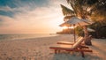 Beautiful sunset beach. Chairs on the sandy beach near the sea. Summer holiday and vacation concept. Inspirational tropical scene. Royalty Free Stock Photo