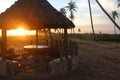 beautiful sunset through a beach hut Royalty Free Stock Photo