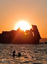 Beautiful sunset on the beach. Malta sunset. Orange sky. Golden romantic sunset.