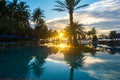 Beautiful sunset at a beach resort in tropics Royalty Free Stock Photo