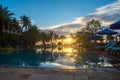 Beautiful sunset at a beach resort in tropics Royalty Free Stock Photo