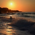 Beautiful sunset on the beach with the sea. Waves on the sea. Greece - Corfu island (Kerkyra) Agios Georgios. Royalty Free Stock Photo