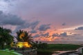 Beautiful sunset behind the great Naga statue in Karon beach Royalty Free Stock Photo