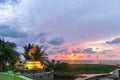 Beautiful sunset behind the great Naga statue in Karon beach Royalty Free Stock Photo