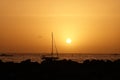 Beautiful sunset boat passing by the sea Royalty Free Stock Photo