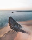 Beautiful sunset at the Brouwersdam Netherlands long exposure photography blue hour rocks pier in the North sea Royalty Free Stock Photo