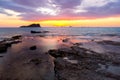 Beautiful sunset at Cala Compte beach in Ibiza, Spain.