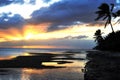 Beautiful sunset captured over a tranquil shoreline on a radiant day