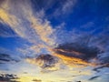 A beautiful sunset in the caribbean with vibrant blue sky and orange clouds reflecting from the sun Royalty Free Stock Photo