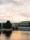 Beautiful sunset cityscape, river and old antique buildings in European city, outdoor. Center of Stockholm Royalty Free Stock Photo