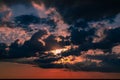Beautiful sunset in the clouds. Blue and red sky at the same time Royalty Free Stock Photo