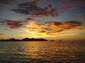 Beautiful sunset clouds and golden waters