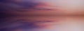 Beautiful sunset in the clouds over the sea.  Pink orange blue purple abstract background. Day and night contrast. Royalty Free Stock Photo