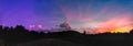 Beautiful sunset with colorfully clouds  close to the forestbeautiful sunset with colorfully clouds  close to the forest Royalty Free Stock Photo