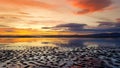 Beautiful sunset colors over the coastline of Allerdale district in Cumbria, UK. Sun setting over the shore of Allonby bay on Royalty Free Stock Photo