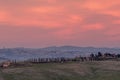 Beautiful sunset on the countryside with Siena in the background, Tuscany, Italy Royalty Free Stock Photo