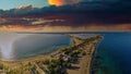 Beautiful sunset with a dramatic sky in front of the sea, Playa Salinas Beach, Dominican Republic