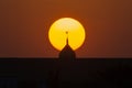 Beautiful sunset in the evening behind the silhouette muslim mosque