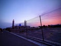 Beautiful sunset evening mosque view with lights. Royalty Free Stock Photo