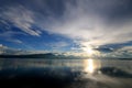 Beautiful sunset and evening sky with mountain and clouds and sunset reflected in the lake for background. Countryside Landscape U Royalty Free Stock Photo