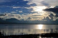 Beautiful sunset and evening sky with mountain and clouds and sunset reflected in the lake for background. Countryside Landscape U Royalty Free Stock Photo