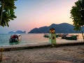 Beautiful sunset with fishing boat in Thailand. Tropical island in Asian sea Royalty Free Stock Photo