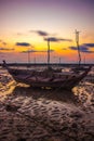 Beautiful sunset with fishing long boat, Koh Lanta, Thailand