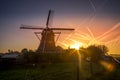 Beautiful sunset in front of windmill Royalty Free Stock Photo