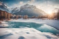 Beautiful sunset, a frozen lake and snow-capped mountains. Royalty Free Stock Photo