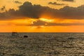 Beautiful sunset and golden twilight, and clouds and a longly cruise ship sailing on the Mediterranean Sea in Tel Aviv, Israel Royalty Free Stock Photo