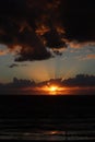 Beautiful sunset on the gulf of mexico.  beautiful orange golden sunset over the ocean.  the sun set through the clouds on the sea Royalty Free Stock Photo