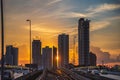 Beautiful sunset with high buildings and Taksin Bridge Royalty Free Stock Photo