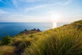 Beautiful sunset at Krating Cape, Nai Harn beach, Phuket, Thailand Royalty Free Stock Photo