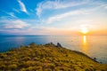 Beautiful sunset at Krating Cape, Nai Harn beach, Phuket, Thailand