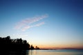 Beautiful sunset. Russian North. Lake and trees. Royalty Free Stock Photo