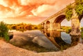 Overview at sunset of the Ancient Bridge of Orosei on the river Cedrino, Sardinia Royalty Free Stock Photo