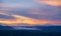 Beautiful sunset landscape from the forest in the national park on top mountain. sunset twilight on the top mountain with sea of