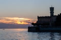 Beautiful sunset light at Langenargen with silhouette of castle Montfort Bodensee