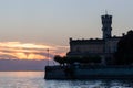 Beautiful sunset light at Langenargen with silhouette of castle Montfort Bodensee