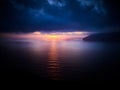Beautiful sunset on the Lipari island with Alicudi and Filicudi islands in sight, Aeolian islands, Sicily, Italy Royalty Free Stock Photo