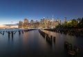 Beautiful Sunset and Lower Manhattan skyline with East River and New York City. Twilight with Reflections