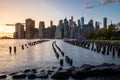 Beautiful Sunset and Lower Manhattan skyline with East River and New York City. Twilight with Reflections