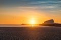 Beautiful sunset at Matosinhos beach in Porto, Portugal. Beautiful Atlantic ocean sparkling in the sun with birds in the air.