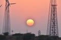 Beautiful Sunset with modern windmill in thar desert jaisalmer Rajasthan India Royalty Free Stock Photo