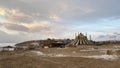 Beautiful sunset on Olkhon island. Striped tent. Northern landscape near the frozen Lake Baikal