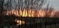 Beautiful sunset in Olney Milton keynes over the river Ouse with orange red and pink sky Royalty Free Stock Photo