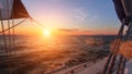 Beautiful sunset in the open sea with sailing yacht. Travel. Royalty Free Stock Photo