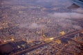 Beautiful sunset over the airport from a plane window on taking off Royalty Free Stock Photo