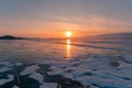 Beautiful sunset over Baikal frozen lake winter season Royalty Free Stock Photo